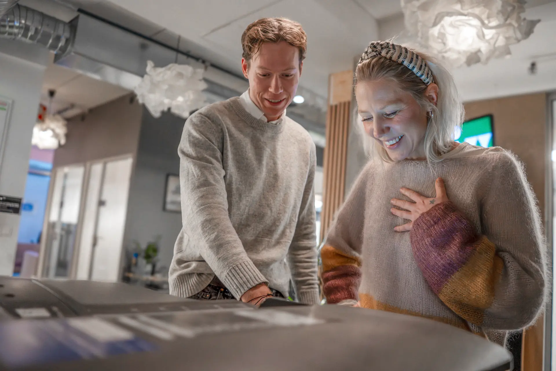 Two people using the printer at Bergen.Works